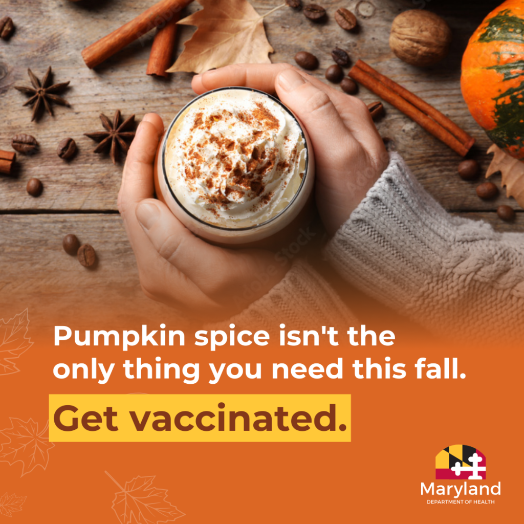 Pumpkin spice isn’t the only thing you need this fall. Get vaccinated. A person holds a pumpkin spice latte.